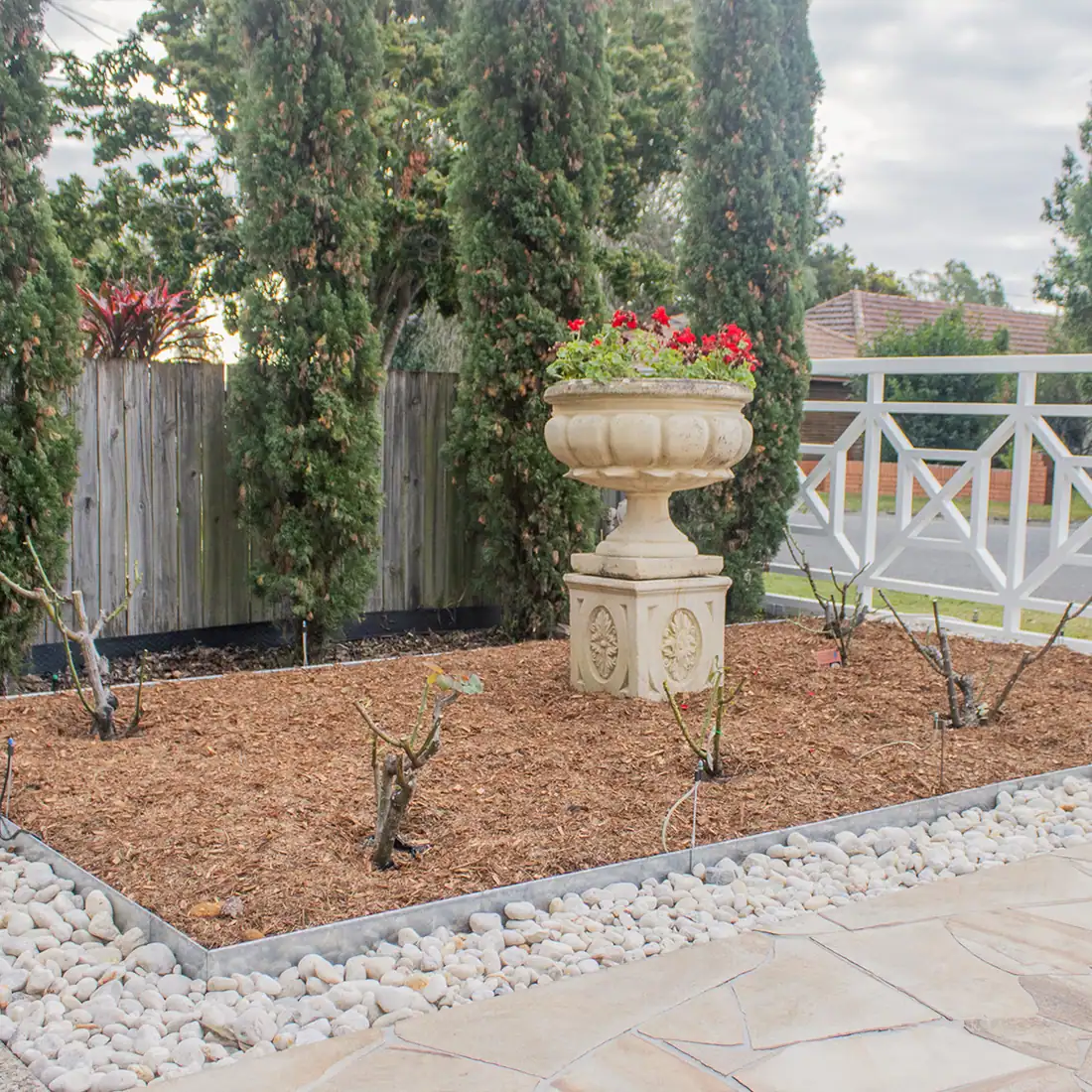 Beds cleared & re-mulched — after